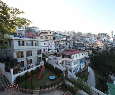 https://imgcld.yatra.com/ytimages/image/upload/t_hotel_yatra_city_desktop/v1422531863/Domestic Hotels/Hotels_Mussoorie/Hotel Paradise Continental/Overview1.jpg